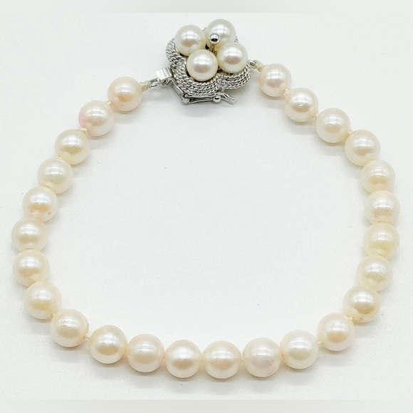 Jewelry - Gorgeous White Pearls Bracelet with Pearl Embellished Silver Clasp
